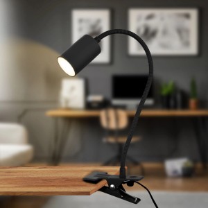 Lampe à pince LED Briloner FLEKS noire avec col de cygne fixée à une table.