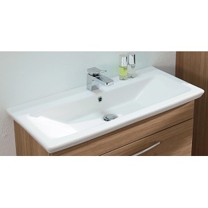 Vasque en céramique blanc brillant 85x40cm avec trou pour robinet mitigeur.