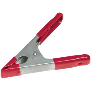 Serre-joint à ressort en métal avec poignées rouges, capacité de serrage 100 mm.