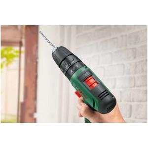 Trapano avvitatore a percussione a batteria Bosch Easy Impact 1200 in verde/nero con punta nel mandrino.