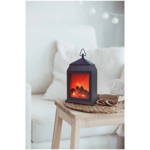 Lanterne LED décorative Fire avec effet de flamme sur une table. Éclairage d'ambiance pour l'intérieur.