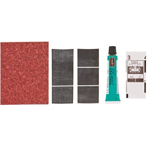 Kit riparazione Tip-Top con toppe, mastice vulcanizzante e carta vetrata per pneumatici bici.