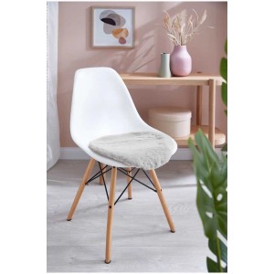 Coussin d'assise Coste gris en polyester (Ø 40 cm) sur une chaise dans un salon.