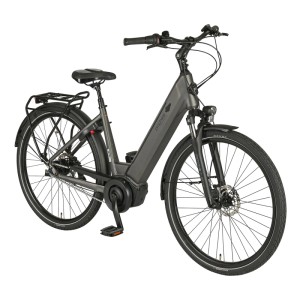 Vélo de ville gris pour femme Prophete City E-Bike Geniesser 3.0 avec moteur central et porte-bagages.