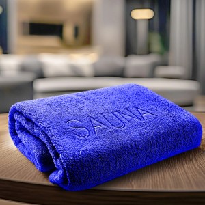 Serviette de sauna bleue en coton (70x200 cm) avec inscription "SAUNA".