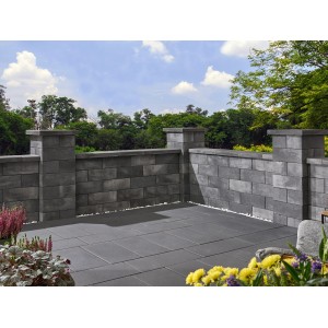 Gartenmauer aus grauen Lindeza Mauersteinen in Vulkananthrazit. Modernes Design mit glatter Oberfläche.