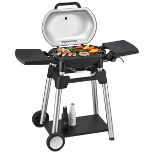 Grill électrique Trisa Grill Force 2200 avec couvercle, aliments et tablettes latérales.