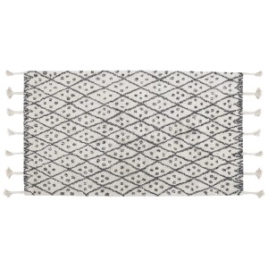 Tapis à poils courts crème (80x150 cm) avec motif géométrique et texture en coton.
