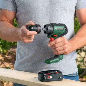 Trapano avvitatore a batteria Bosch Advanced Drill 18V-80 con accessorio, batteria in primo piano.