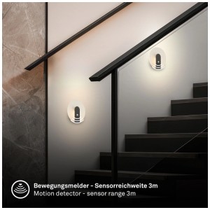 Applique murale à batterie noire Briloner Aurora sur un mur d'escalier. Lampe LED avec détecteur de mouvement.