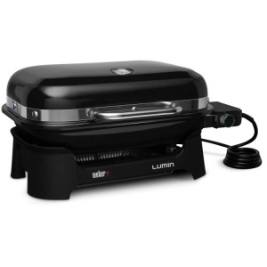 Grill elettrico Weber Lumin Compact nero con coperchio e indicatore di temperatura.