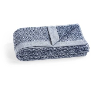Lafuma Frotteeauflage Littoral Relax piegata, in cotone, motivo blu e bianco.
