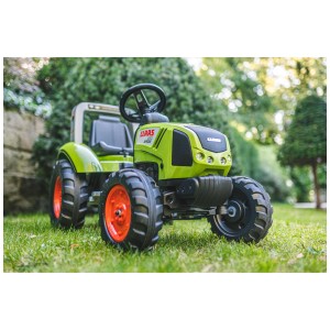 Falk Claas Trattore con Rimorchio Gr. L, un trattore verde per bambini con cerchi rossi su erba.