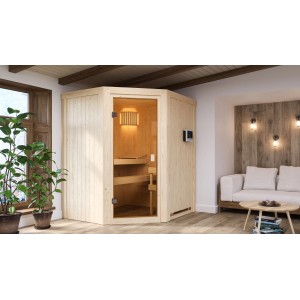 Sauna Woodfeeling Faurin con porta in vetro bronzato e stufa da 9 kW in soggiorno.