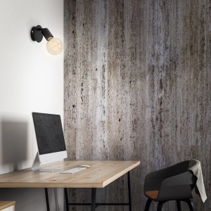 Spot mural noir Briloner 1-Spot Pearl E27 au-dessus d'un bureau.