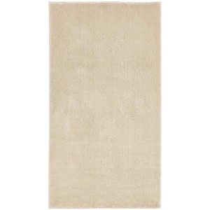 Tapis Andiamo Arezzo crème, 60x110 cm. Tapis à poils longs avec des poils doux.