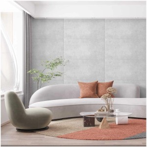 Panneau de plafond Decorate béton XPS gris clair dans un salon, 510x510 mm. Profilés décoratifs pour design moderne.