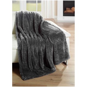 Coperta super-soft antracite effetto pelliccia di agnello (150x200 cm) su un divano.