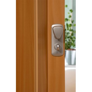 Porte accordéon Spacy aspect cerisier, détail de la serrure.