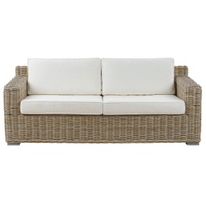 Canapé de jardin Beliani Ardea 2 places en rotin naturel avec coussins clairs. Mobilier de jardin lounge élégant.