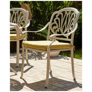 Beliani Set: 4 sedie da giardino Ancona in metallo bianco con cuscini gialli.