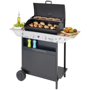 Campingaz Barbecue a gas Xpert 200LW, acciaio inox, nero, con cibo e contorni sui tavoli laterali.