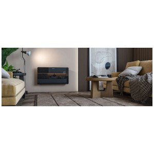 Termoconvettore nero Olimpia Splendid Caleo Glass WiFi montato a parete in soggiorno.