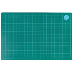 Grüne Schneidmatte 30x45 cm mit Raster für Bastelarbeiten und Modellbau.