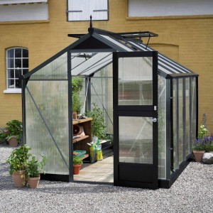 Serra Juliana Compact 6 antracite con porta aperta e piante.