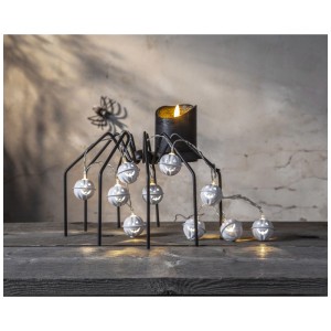 Guirlande lumineuse LED Halloween Star Trading avec motifs citrouilles et lumière blanche chaude, idéal pour Halloween.
