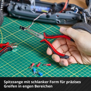 Set d'outils Einhell : Pince de précision en utilisation avec modélisme en arrière-plan.