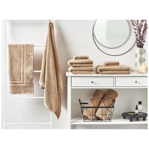 Ensemble de 9 serviettes en coton beige Mitiaro avec motif zigzag.