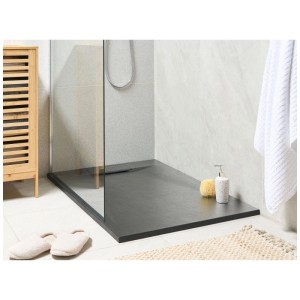 Receveur de douche Azzurro noir en plastique aspect pierre, mat et texturé, plat dans une salle de bain moderne.