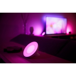 Lampada da tavolo LED Philips Hue Bloom bianca con luce rosa per accenti d'atmosfera.