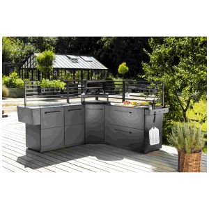 Cozze Pizzaofen Erhöhung Elements als Teil einer grauen Outdoorküche im Garten.