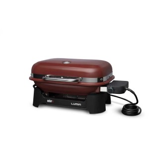 Grill elettrico Weber Lumin Compact rosso con coperchio e controllo temperatura.