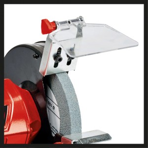 Gros plan sur la meuleuse double Einhell TC-BG 150 avec meule et pare-étincelles.