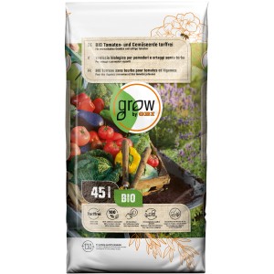 Sac de terreau bio tomates et légumes GROW by OBI, 45l, sans tourbe. Légumes et tomates en arrière-plan.