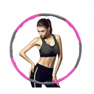 Hula Hoop fitness rosa e grigio con donna in abbigliamento sportivo.