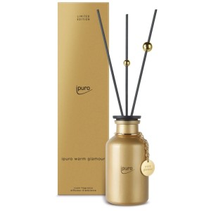 Parfum d'ambiance Ipuro Warm Glamour Édition Limitée dans un flacon doré avec bâtonnets.