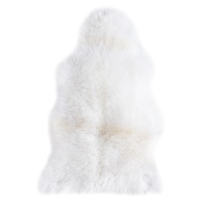 Peau de mouton véritable blanche et douce (env. 60x85 cm) pour un intérieur chaleureux.