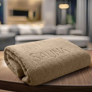 Serviette de sauna marron (70x200 cm) en coton avec inscription "SAUNA".