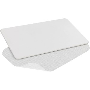 Tappetino da bagno bianco Wenko Simi, 60x39 cm, in diatomite con rete antiscivolo per una presa sicura in bagno.
