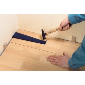 LUX Tire-lame Classic utilisé pour la pose de stratifié/parquet au mur.