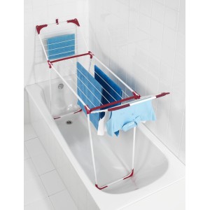 Stendibiancheria Wenko Summer Dry, bianco-rosa, posizionato sopra una vasca da bagno con bucato.