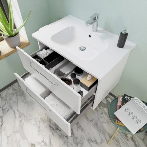 Meuble sous-vasque Pelipal Trentino, blanc brillant, 75 cm de large, avec deux tiroirs et des coulissants ouverts.