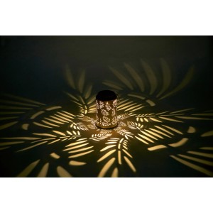 Lanterne solaire LED beige avec motif de feuilles et lumière blanche chaude pour jardin et balcon.