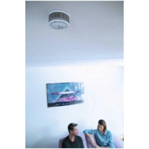 Mini détecteur de fumée Abus GRWM30600 monté au plafond de la pièce.