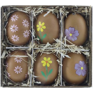 Box mit 6 braunen, echten Eiern mit Blumendekor als Gartendekoration.