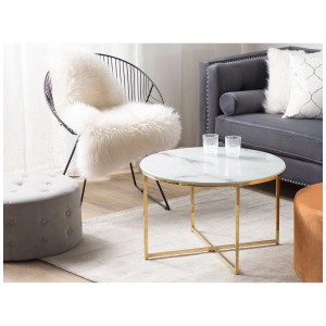 Table basse ronde Quincy aspect marbre avec structure en acier inoxydable doré.